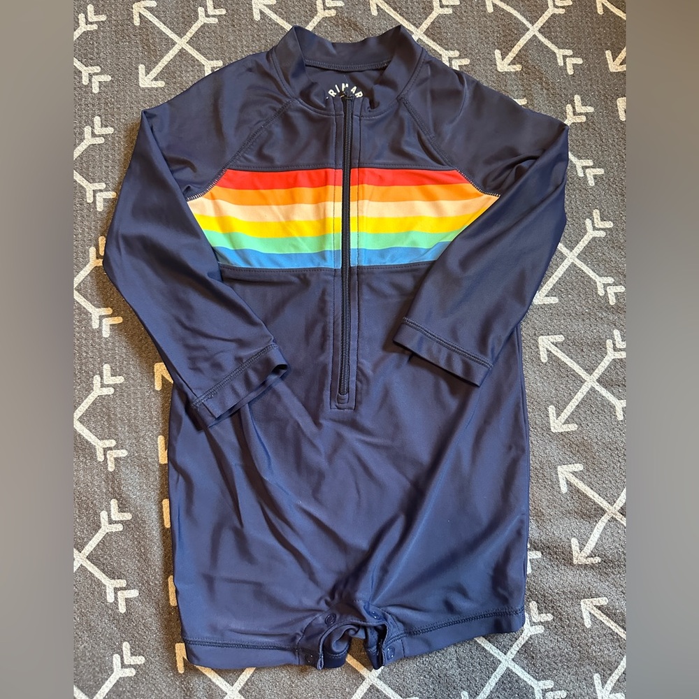 Primary Blue and Rainbow One Piece Rashguard